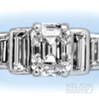 0.72 Carats Emerald-Cut Diamond (GIA F/VVS1),  Baguette Diamond and Platinum Ring